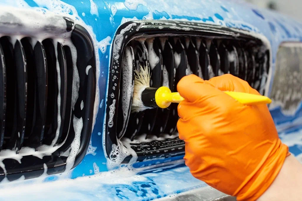 Front grill cleaning with pressure washing
